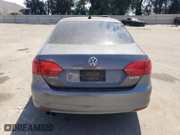 2013 Volkswagen Jetta SE with VIN 3VWDP7AJ5DM355176, listed as a Copart auction lot 60324525 with 192,226 mi miles and Salvage title. Bid and sale history available at DreamBid. Image 6.