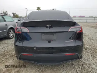 2024 Tesla Model Y Performance with VIN 7SAYGDEF1RF028278, listed as a Copart auction lot 48900935 with 41,606 mi miles and Salvage Title. Bid and sale history available at DreamBid. Image 6.