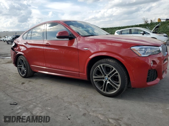 2015 BMW X4 xDrive28i with VIN 5UXXW3C57F0M87615, listed as a Copart auction lot 45138994 with 101,400 mi miles. Bid and sale history available at carsss.com. Image 4.