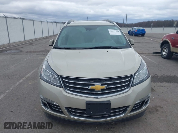 2015 Chevrolet Traverse LTZ z VIN 1GNKRJKD6FJ237851, wystawiony jako IAAI lot #41847524 z przebiegiem 84 809 mil mil oraz . Historia ofert i sprzedaży dostępna na DreamBid. Obrazek 12.