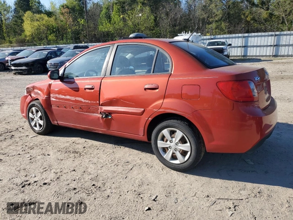 2010 Kia Rio LX with VIN KNADH4A32A6678111, listed as a Copart auction lot 52632895 with 98,392 mi miles and Salvage Title. Bid and sale history available at carsss.com. Image 2.