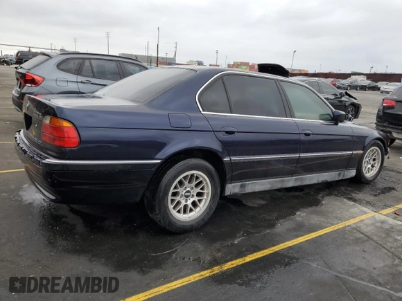 1998 BMW 7 Series 740il with VIN WBAGJ8321WDM23045, listed as a Copart auction lot 87018324 with 43,906 mi miles and Salvage Title. Bid and sale history available at carsss.com. Image 3.