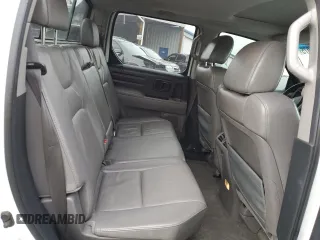 2010 Honda Ridgeline RTL with VIN 5FPYK1F58AB005088, listed as a Copart auction lot 47477975 with 128,538 mi miles and Salvage Title. Bid and sale history available at carsss.com. Image 10.