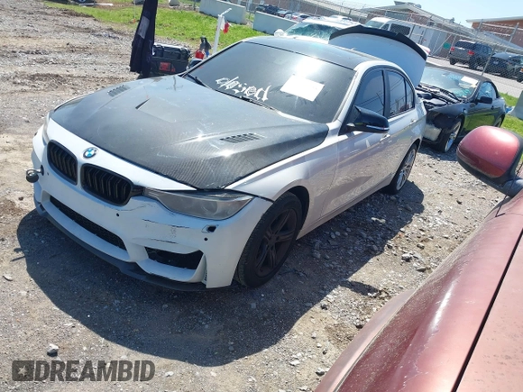 2014 BMW 3 Series 320i with VIN WBA3B1C51EK132083, listed as a IAAI auction lot 41985295 with 158,626 mi miles. Bid and sale history available at carsss.com. Image 2.