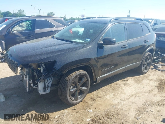 2021 Jeep Cherokee Altitude with VIN 1C4PJLLBXMD112667, listed as a IAAI auction lot 41959004 with 25,524 mi miles and . Bid and sale history available at DreamBid. Image 18.