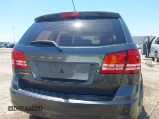 2015 Dodge Journey American Value z VIN 3C4PDCAB2FT637391, wystawiony jako IAAI lot #42354094 z przebiegiem 130 743 mil mil oraz . Historia ofert i sprzedaży dostępna na DreamBid. Obrazek 16.