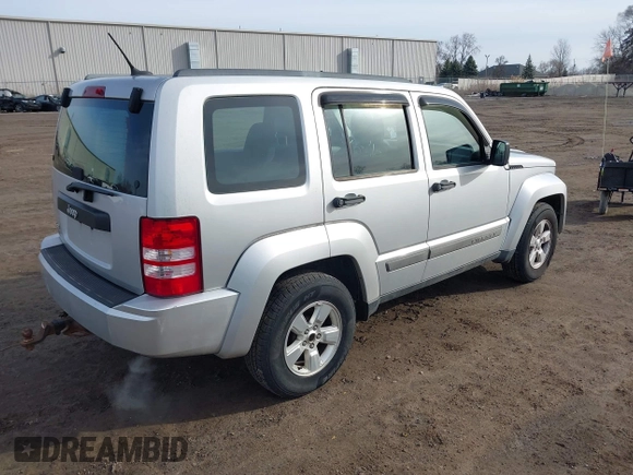 2012 Jeep Liberty Sport with VIN 1C4PJMAKXCW133658, listed as a IAAI auction lot 41814977 with 128,328 mi miles and . Bid and sale history available at carsss.com. Image 4.