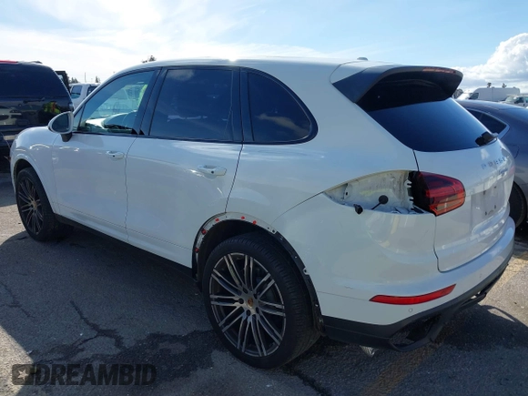 2017 Porsche Cayenne with VIN WP1AA2A23HKA80695, listed as a IAAI auction lot 41532359 with 71,628 mi miles. Bid and sale history available at carsss.com. Image 3.