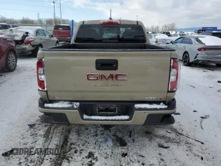 2021 GMC Canyon 4WD AT4 z VIN 1GTG6FEN8M1157828, wystawiony jako Copart lot #88392435 z przebiegiem 45 252 mil mil oraz Szkody całkowita. Historia ofert i sprzedaży dostępna na DreamBid. Obrazek 6.