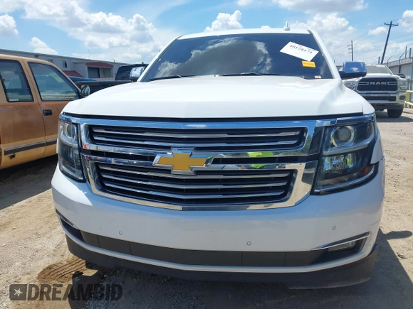 2020 Chevrolet Tahoe LTZ with VIN 1GNSCCKCXLR215899, listed as a IAAI auction lot 40128171 with 109,541 mi miles and . Bid and sale history available at DreamBid. Image 12.