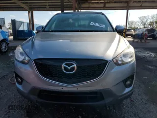 2014 Mazda CX-5 Touring with VIN JM3KE2CY8E0305641, listed as a Copart auction lot 42617165 with 107,336 mi miles and Salvage Title. Bid and sale history available at carsss.com. Image 5.
