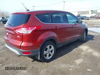 2014 Ford Escape SE with VIN 1FMCU9GX3EUA81161, listed as a IAAI auction lot 41968609 with 112,931 mi miles and . Bid and sale history available at DreamBid. Image 4.