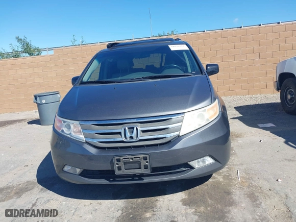 2011 Honda Odyssey EX-L with VIN 5FNRL5H68BB092628, listed as a IAAI auction lot 41820351 with 243,538 mi miles. Bid and sale history available at carsss.com. Image 12.