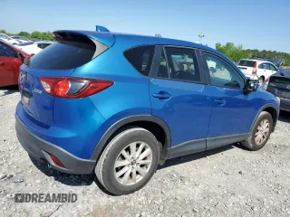 2013 Mazda CX-5 Touring with VIN JM3KE4CE7D0109173, listed as a Copart auction lot 52594285 with 149,288 mi miles and Clean Title. Bid and sale history available at DreamBid. Image 3.