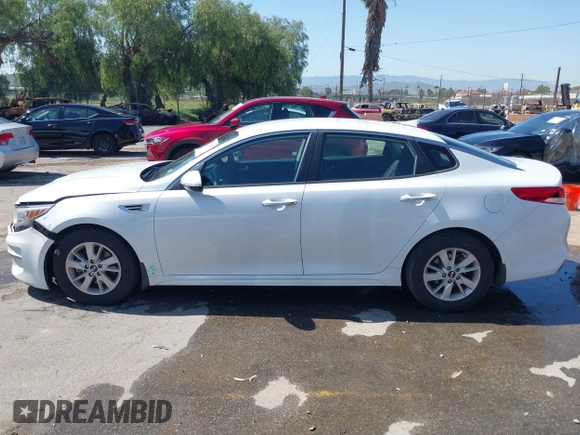 2016 Kia Optima LX with VIN 5XXGT4L3XGG054286, listed as a IAAI auction lot 41924937 with 146,555 mi miles. Bid and sale history available at carsss.com. Image 14.