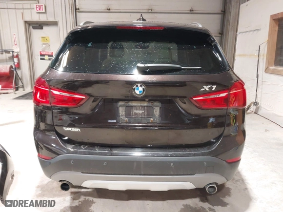 2016 BMW X1 xDrive28i with VIN WBXHT3C33GP886935, listed as a IAAI auction lot 41707367 with 73,201 mi miles. Bid and sale history available at carsss.com. Image 17.