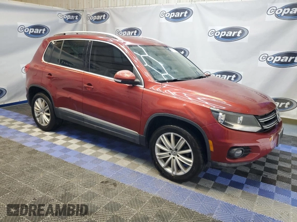 2012 Volkswagen Tiguan SE z VIN WVGAV7AX9CW002143, wystawiony jako Copart lot #55820395 z przebiegiem 174 356 mil mil oraz Czysty tytuł • Clean title. Historia ofert i sprzedaży dostępna na DreamBid. Obrazek 4.