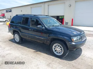 2002 Jeep Grand Cherokee Limited with VIN 1J8GX58N32C130002, listed as a IAAI auction lot 42615159 with 247,791 mi miles and . Bid and sale history available at DreamBid. Image 1.