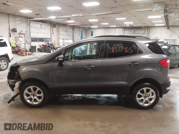 2018 Ford EcoSport SE z VIN MAJ6P1UL9JC209906, wystawiony jako IAAI lot #41977465 z przebiegiem 58 636 mil mil oraz . Historia ofert i sprzedaży dostępna na DreamBid. Obrazek 14.
