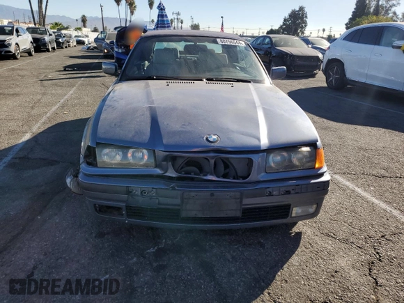1999 BMW 3 Series 323icA with VIN WBABJ8332XEM24560, listed as a Copart auction lot 80756544 with 63,056 mi miles and Salvage Title. Bid and sale history available at carsss.com. Image 5.