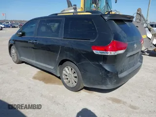 2013 Toyota Sienna XLE with VIN 5TDDK3DC8DS051928, listed as a IAAI auction lot 41857402 with 175,839 mi miles and . Bid and sale history available at DreamBid. Image 3.