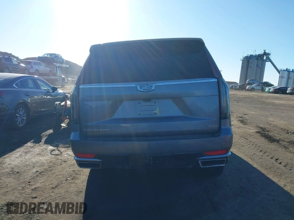2021 Cadillac Escalade Premium Luxury z VIN 1GYS4CKL2MR231788, wystawiony jako IAAI lot #41630686 z przebiegiem 56 672 mil mil oraz . Historia ofert i sprzedaży dostępna na DreamBid. Obrazek 16.