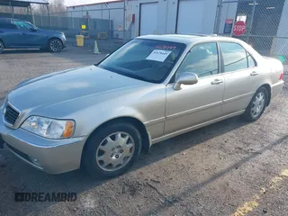 2004 Acura RL w/Navigation System z VIN JH4KA96664C001291, wystawiony jako IAAI lot #41678449 z przebiegiem 83 954 mil mil oraz . Historia ofert i sprzedaży dostępna na DreamBid. Obrazek 2.
