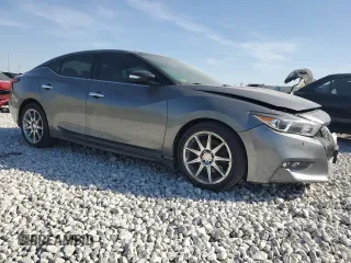 2016 Nissan Maxima SL z VIN 1N4AA6AP2GC379386, wystawiony jako Copart lot #53165855 z przebiegiem 118 995 mil mil oraz Szkoda całkowita • Salvage title. Historia ofert i sprzedaży dostępna na DreamBid. Obrazek 4.
