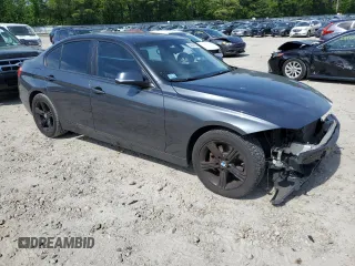 2013 BMW 3 Series 328i xDrive with VIN WBA3B5G5XDNS03246, listed as a Copart auction lot 58246795 with 181,438 mi miles and Clean title. Bid and sale history available at DreamBid. Image 4.