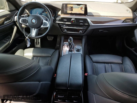 2019 BMW 5 Series M550i xDrive with VIN WBAJB9C5XKB287877, listed as a Copart auction lot 52994065 with 52,460 mi miles and Salvage title. Bid and sale history available at DreamBid. Image 8.