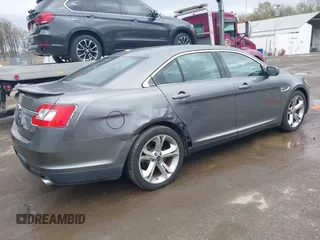 2011 Ford Taurus SHO with VIN 1FAHP2KT8BG100347, listed as a IAAI auction lot 41964597 with 104,603 mi miles and . Bid and sale history available at DreamBid. Image 4.