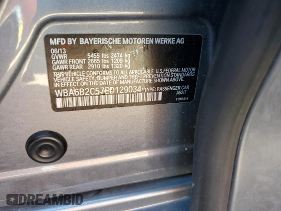 2014 BMW 6 Series 650i z VIN WBA6B2C57ED129034, wystawiony jako Copart lot #72774814 z przebiegiem 116 835 mil mil oraz Szkoda całkowita • Salvage title. Historia ofert i sprzedaży dostępna na DreamBid. Obrazek 12.