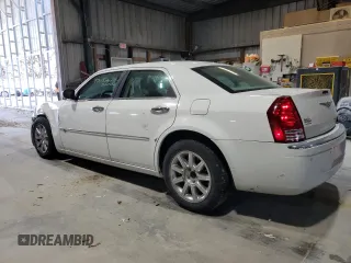 2010 Chrysler 300 with VIN 2C3CA6CT8AH329985, listed as a Copart auction lot 84556624 with 165,348 mi miles and Salvage Title. Bid and sale history available at carsss.com. Image 2.