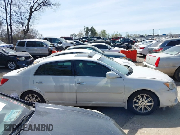 2010 Toyota Avalon XL with VIN 4T1BK3DB6AU363456, listed as a IAAI auction lot 41909395 with 251,402 mi miles and . Bid and sale history available at DreamBid. Image 13.