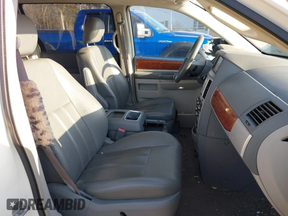 2009 Chrysler Town & Country Touring with VIN 2A8HR54179R631851, listed as a IAAI auction lot 41786165 with 126,988 mi miles and . Bid and sale history available at DreamBid. Image 5.