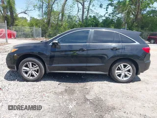 2014 Acura RDX with VIN 5J8TB3H31EL011023, listed as a IAAI auction lot 42091134 with 206,693 mi miles and . Bid and sale history available at DreamBid. Image 14.