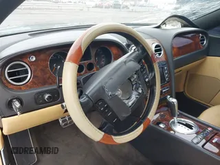 2005 Bentley Continental GT GT z VIN SCBCR63W55C025099, wystawiony jako IAAI lot #42208951 z przebiegiem 123 712 mil mil oraz . Historia ofert i sprzedaży dostępna na DreamBid. Obrazek 19.