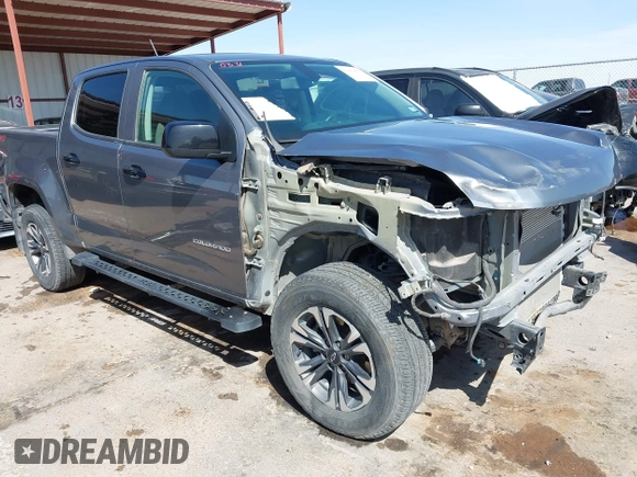 2021 Chevrolet Colorado 4WD Z71 z VIN 1GCGTDEN7M1117558, wystawiony jako IAAI lot #41911673 z przebiegiem 51 838 mil mil oraz . Historia ofert i sprzedaży dostępna na DreamBid. Obrazek 1.