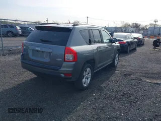2013 Jeep Compass Latitude with VIN 1C4NJDEB7DD261645, listed as a IAAI auction lot 41948272 with 86,008 mi miles. Bid and sale history available at carsss.com. Image 4.