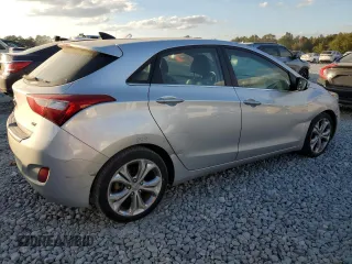 2013 Hyundai Elantra GT with VIN KMHD35LE7DU090495, listed as a Copart auction lot 77133264 with 118,660 mi miles and Salvage Title. Bid and sale history available at carsss.com. Image 3.