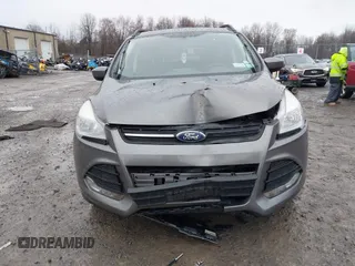 2014 Ford Escape SE with VIN 1FMCU9GX3EUB91417, listed as a IAAI auction lot 42009257 with 87,164 mi miles and . Bid and sale history available at DreamBid. Image 6.