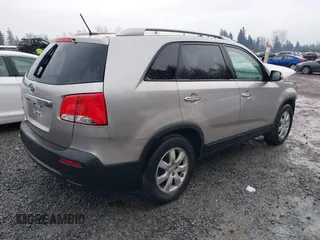 2013 Kia Sorento LX with VIN 5XYKT4A25DG379178, listed as a IAAI auction lot 41080352 with 112,927 mi miles. Bid and sale history available at carsss.com. Image 4.
