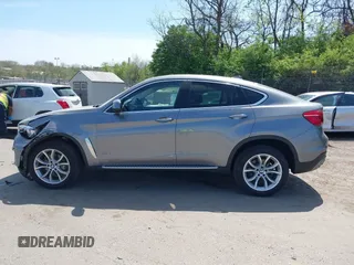 2016 BMW X6 xDrive35i with VIN 5UXKU2C53G0N84273, listed as a IAAI auction lot 42104112 with 61,183 mi miles and . Bid and sale history available at DreamBid. Image 15.