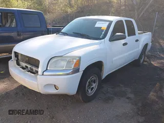 2007 Mitsubishi Raider LS with VIN 1Z7HC28K37S234275, listed as a IAAI auction lot 41656693 with 200,354 mi miles. Bid and sale history available at carsss.com. Image 2.