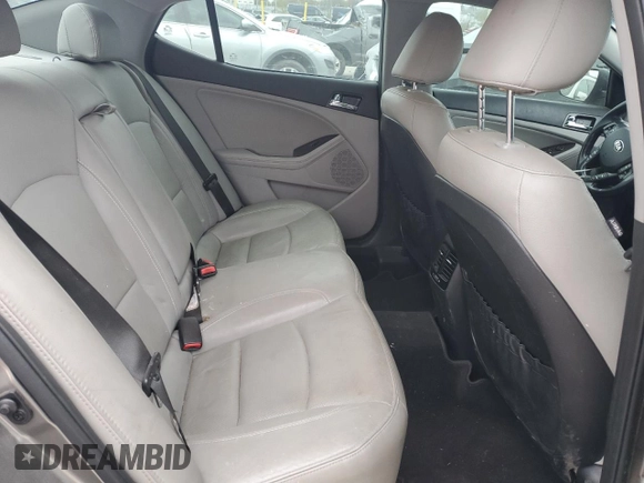 2013 Kia Optima EX z VIN 5XXGN4A7XDG224691, wystawiony jako Copart lot #52872175 z przebiegiem 218 951 mil mil oraz Szkoda całkowita • Salvage title. Historia ofert i sprzedaży dostępna na DreamBid. Obrazek 10.