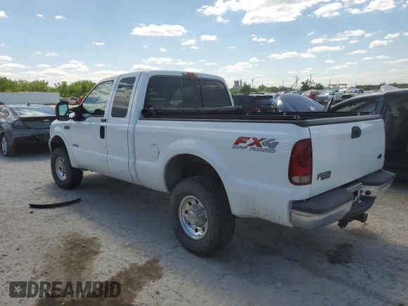 2004 Ford F-250 XL with VIN 1FTNX21P04EA92082, listed as a Copart auction lot 55311935 with 217,363 mi miles and Salvage title. Bid and sale history available at DreamBid. Image 2.