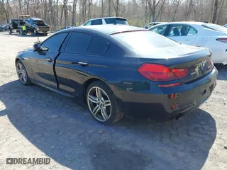 2014 BMW 6 Series 640i xDrive with VIN WBA6B8C58EDZ72405, listed as a IAAI auction lot 42076517 with 101,704 mi miles. Bid and sale history available at carsss.com. Image 3.