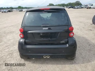 2009 Smart fortwo Pure z VIN WMEEJ31XX9K269982, wystawiony jako Copart lot #59214215 z przebiegiem 99 711 mil mil oraz Tytuł czysty. Historia ofert i sprzedaży dostępna na DreamBid. Obrazek 6.