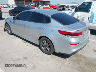 2019 Kia Optima LX with VIN 5XXGT4L39KG323046, listed as a IAAI auction lot 42035766 with 164,643 mi miles and . Bid and sale history available at DreamBid. Image 3.