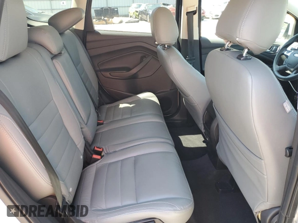 2015 Ford Escape SE z VIN 1FMCU0G76FUA49060, wystawiony jako Copart lot #58174495 z przebiegiem 50 148 mil mil oraz Szkoda całkowita • Salvage title. Historia ofert i sprzedaży dostępna na DreamBid. Obrazek 11.